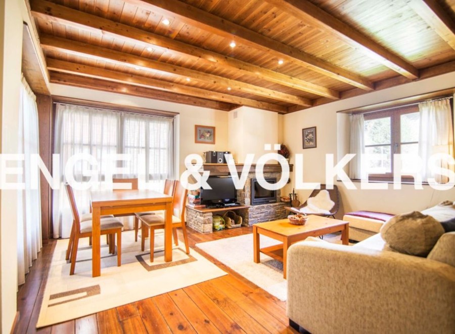 This stunning property boasts a spacious open-plan living area with a cozy fireplace, perfect for relaxing evenings.