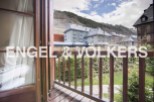 This stunning property boasts a private balcony with breathtaking mountain views.