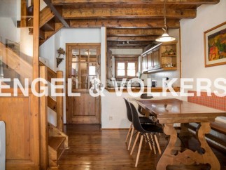 Rustic charm meets modern comfort in this stunning property.