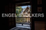 Wake up to breathtaking mountain views from this charming chalet.