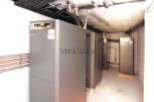 This property boasts a state-of-the-art heating system, featuring multiple high-efficiency heat pumps neatly arranged in a dedicated room.