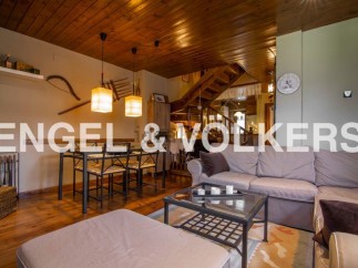 Cozy mountain home with rustic charm and modern amenities.
