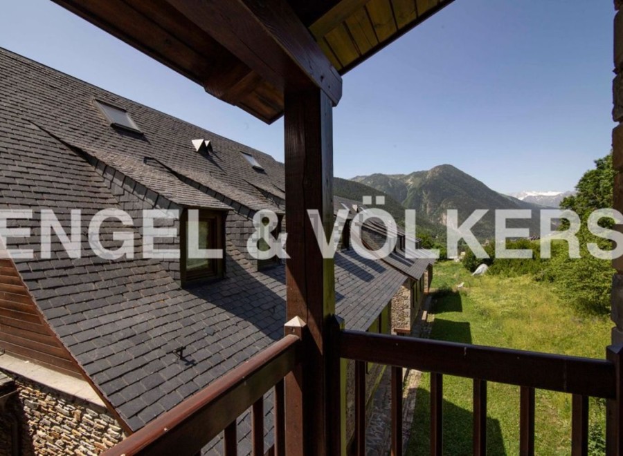 Mountain views from a balcony of this charming chalet.