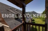 Mountain views from a balcony of this charming chalet.