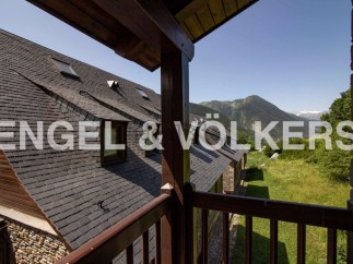 Mountain views from a balcony of this charming chalet.