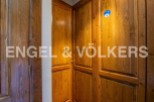 This stunning property boasts exquisite wooden cabinetry throughout, adding a touch of rustic elegance to the space.