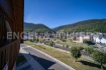 This stunning property boasts breathtaking views of the Pyrenees mountains and a charming riverside setting.