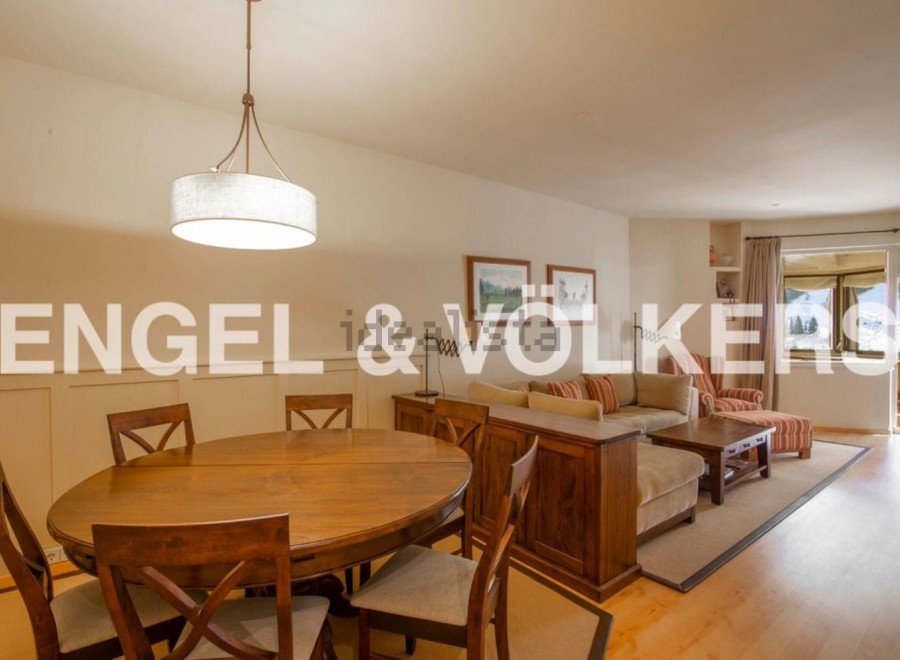 This stunning apartment boasts a spacious open-plan living and dining area, perfect for entertaining.