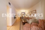 Spacious living area with hardwood floors and ample natural light.