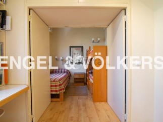 This charming property boasts a well-equipped bunk bed room, perfect for families or guests.