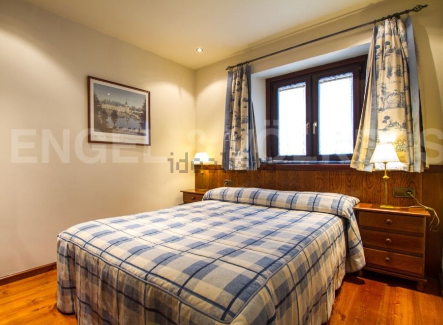 Cozy bedroom with a charming ambiance.
