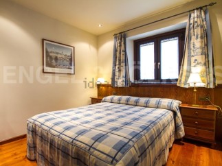 Cozy bedroom with a charming ambiance.