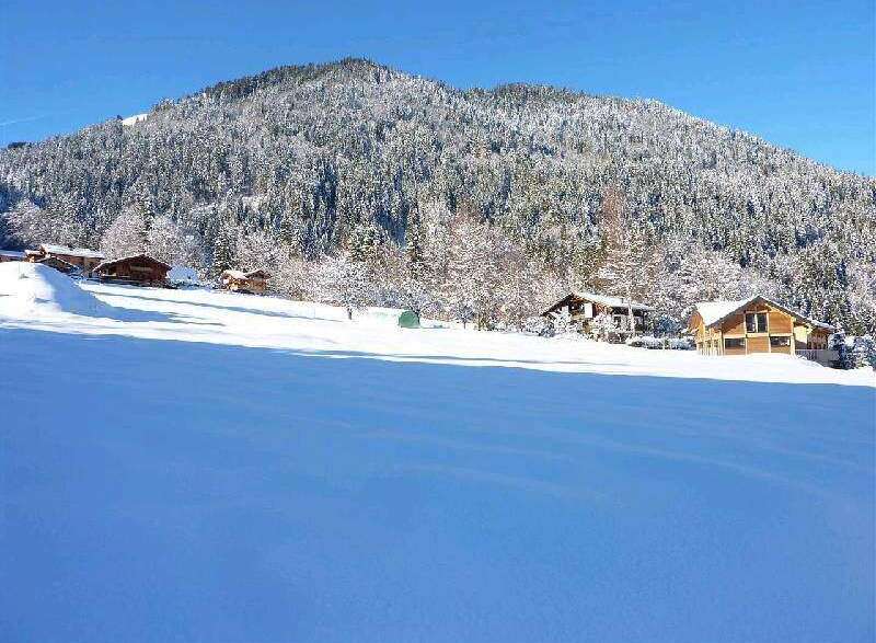 Nestled in a snowy mountainside, this charming chalet offers breathtaking views and serene winter landscapes.