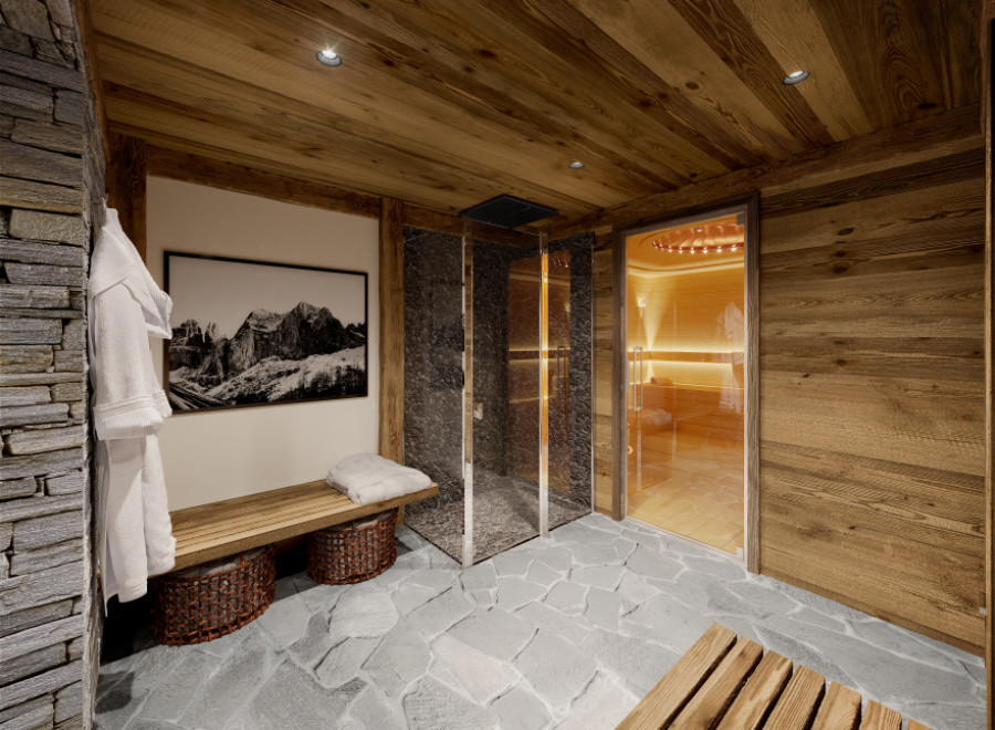 Luxurious spa with wooden interior, featuring a sauna and shower.