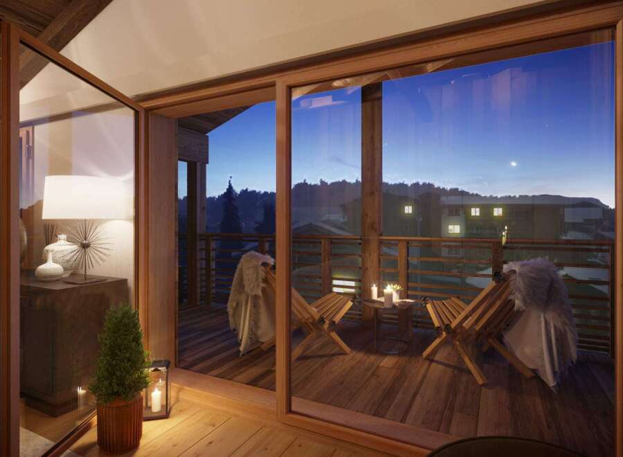 Cozy mountain retreat with private balcony offering breathtaking sunset views.