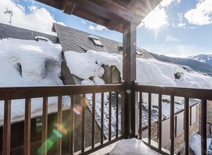 Enjoy breathtaking mountain views from this charming property.