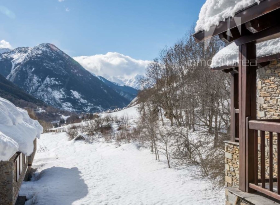 Experience the tranquility of mountain living in this stunning property.