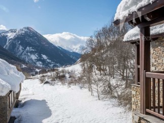 Experience the tranquility of mountain living in this stunning property.