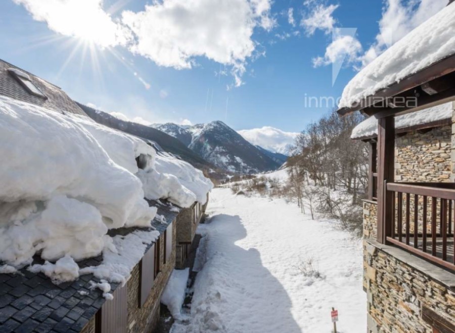 Experience the charm of this stunning mountain property, nestled in a picturesque winter wonderland.