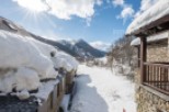 Experience the charm of this stunning mountain property, nestled in a picturesque winter wonderland.