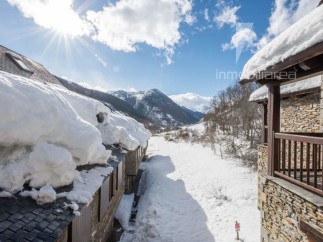 Experience the charm of this stunning mountain property, nestled in a picturesque winter wonderland.