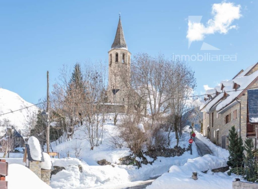 Discover a charming property nestled in a picturesque winter wonderland.