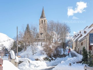 Discover a charming property nestled in a picturesque winter wonderland.