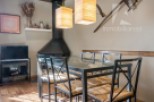 Discover a charming dining area with a rustic touch.