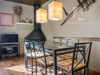 Discover a charming dining area with a rustic touch.