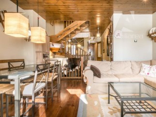 Discover this charming property featuring a cozy living space with a comfortable sofa and a stylish glass coffee table.