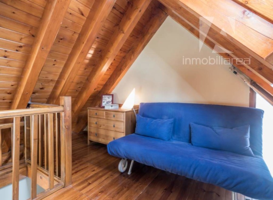 Discover the charm of this unique property with its stunning wooden beamed ceilings.
