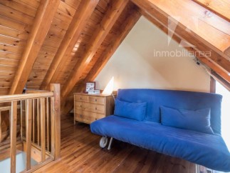 Discover the charm of this unique property with its stunning wooden beamed ceilings.