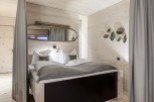 Discover a cozy bedroom retreat with a unique design.