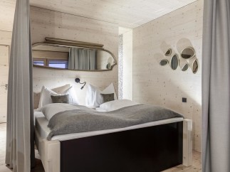 Discover a cozy bedroom retreat with a unique design.