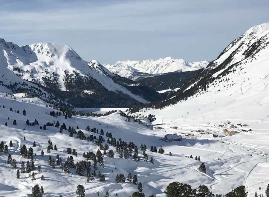 Experience the breathtaking beauty of the snow-covered mountains.
