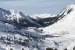 Experience the breathtaking beauty of the snow-covered mountains.