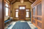 Step into a welcoming entryway with a rustic charm.