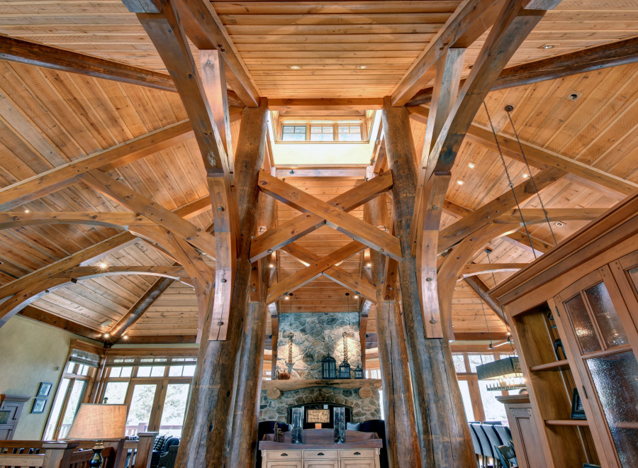Experience the grandeur of this stunning home with its impressive wooden architecture.