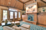 This stunning living room boasts a cozy fireplace, perfect for chilly evenings.