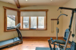 This home gym offers a dedicated space for fitness enthusiasts.