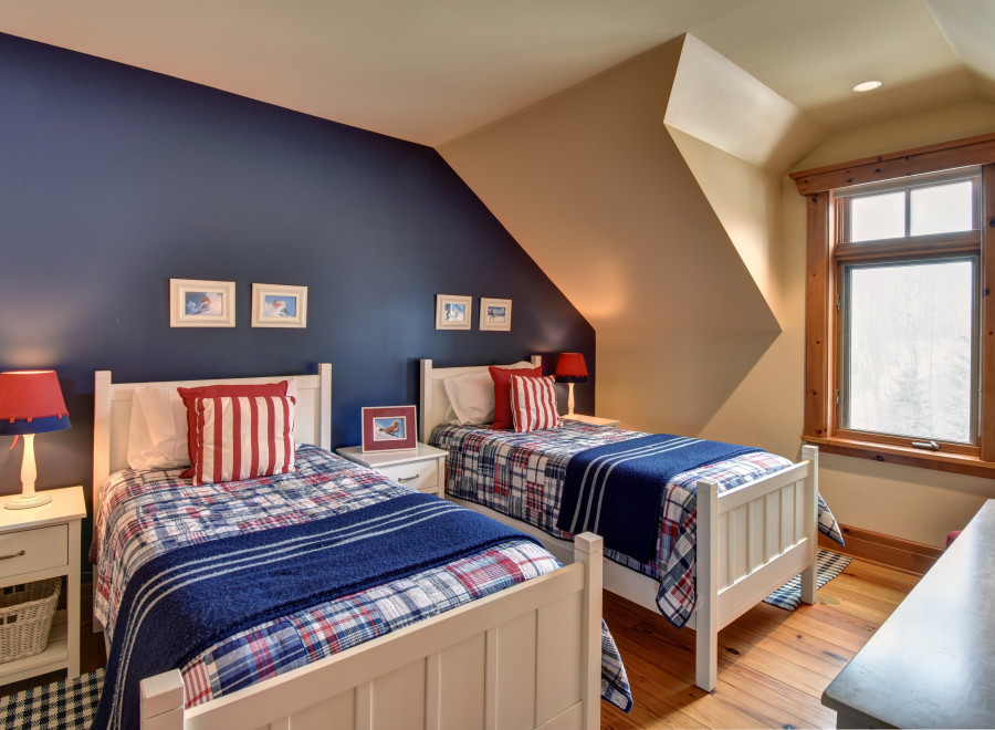 This cozy bedroom features two twin beds, perfect for a guest room or kids' space.