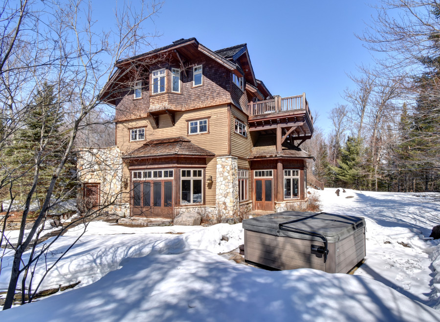 This stunning property boasts a beautiful exterior with a unique architectural design.