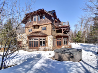 This stunning property boasts a beautiful exterior with a unique architectural design.