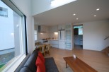 Discover a bright and airy living space with a modern kitchen and dining area.