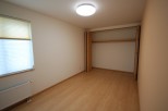 Discover a bright and airy bedroom with ample natural light.