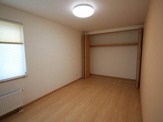 Discover a bright and airy bedroom with ample natural light.