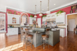 This stunning kitchen boasts a spacious island with seating, perfect for entertaining.