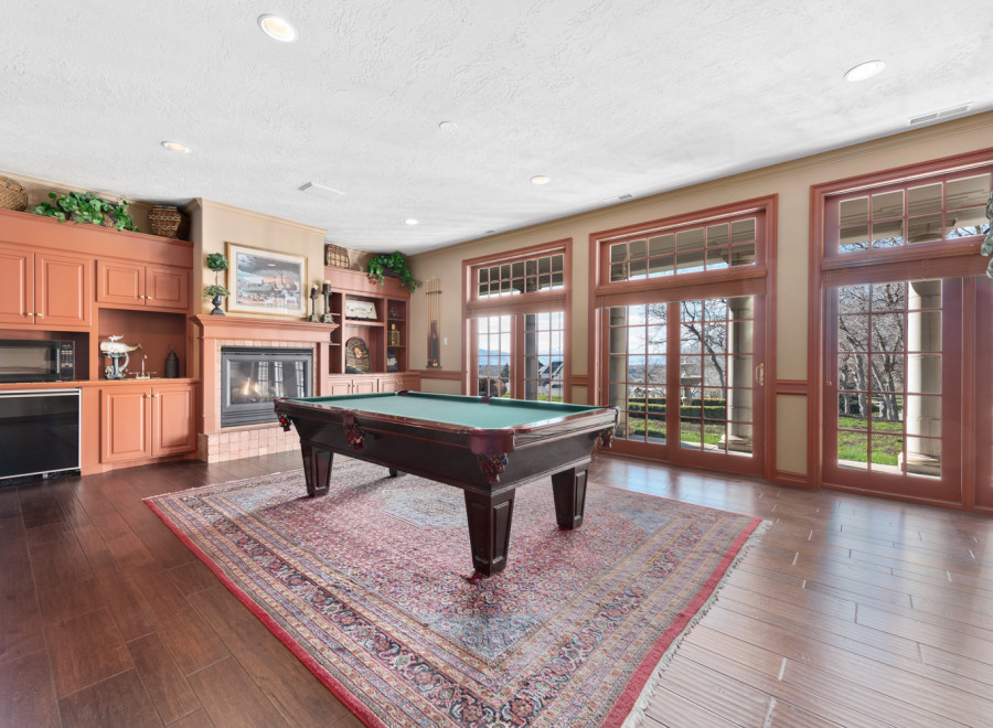 Step into luxury with this stunning property featuring a spacious game room.