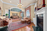 Step into luxury with this stunning property, showcasing an elegant living space.