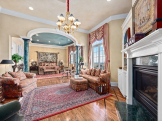 Step into luxury with this stunning property, showcasing an elegant living space.